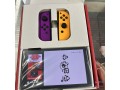 nintendo-switch-oled-version-64gb-new-controller-games-small-0